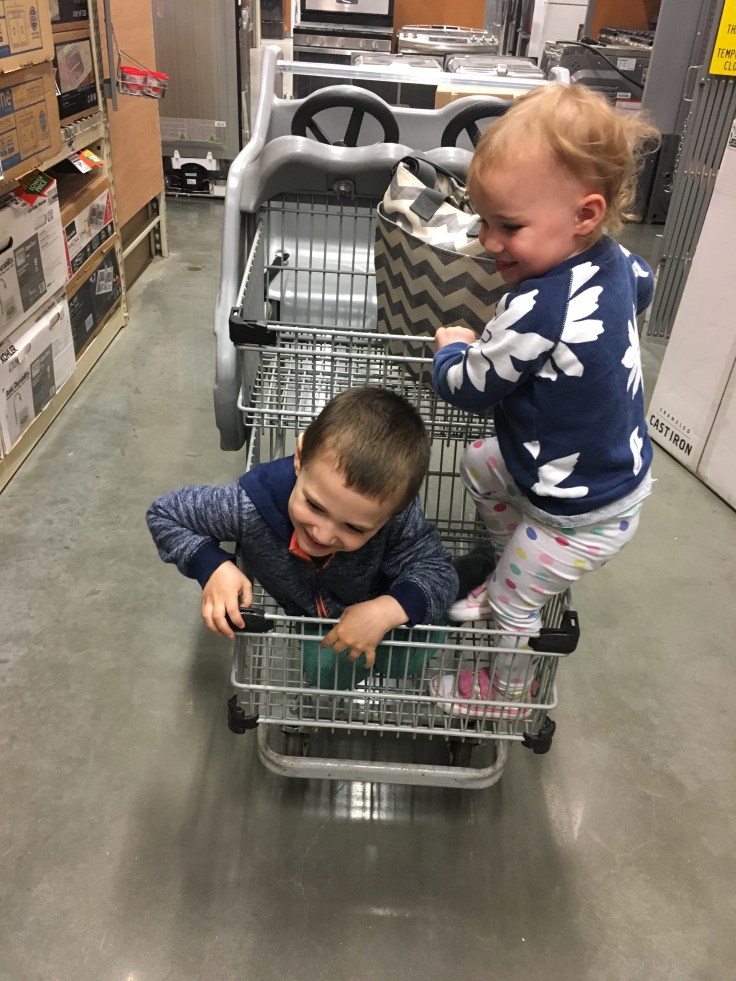 Kat and Reece try to cramp into the cart