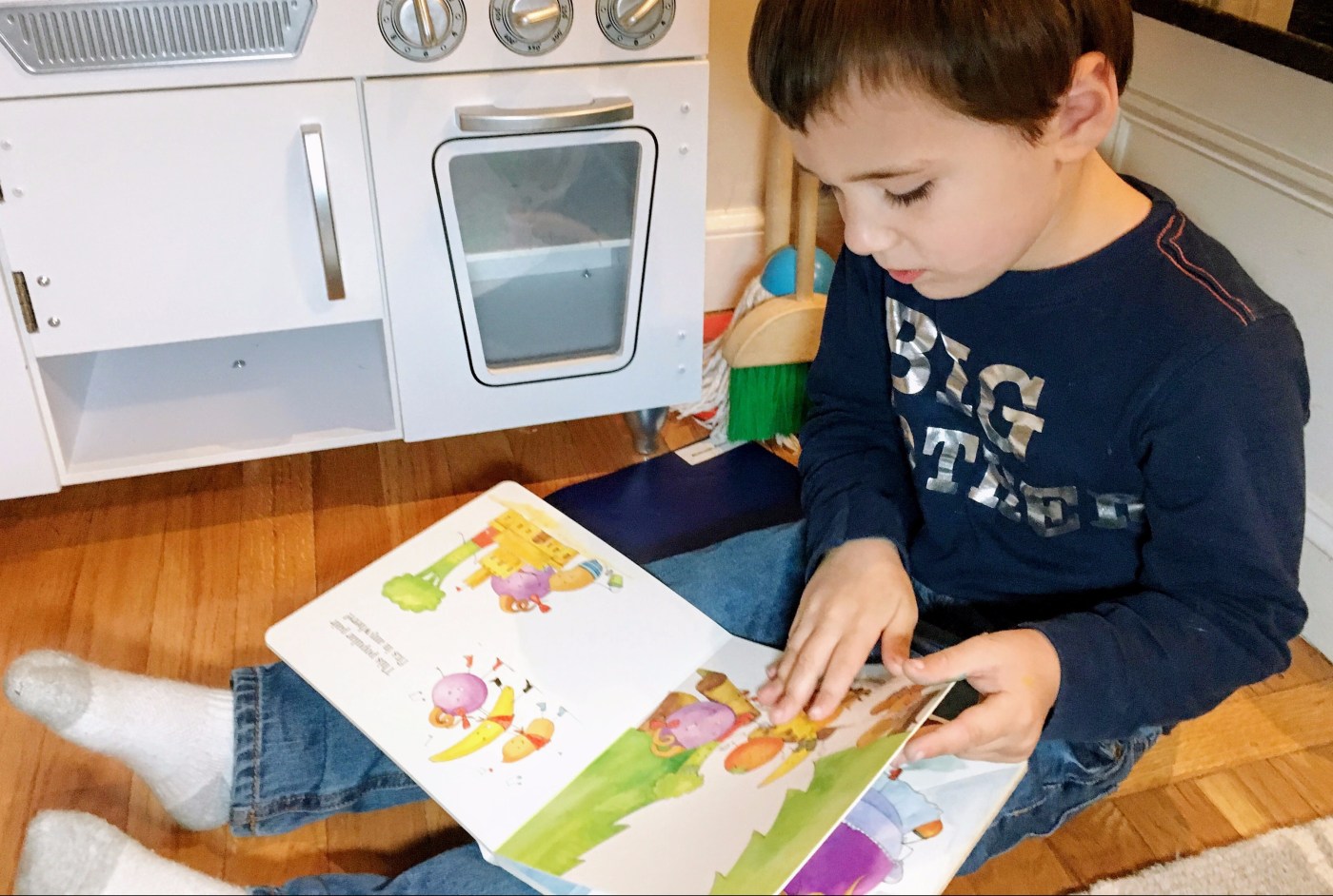 Reece reading Peanut and Grape