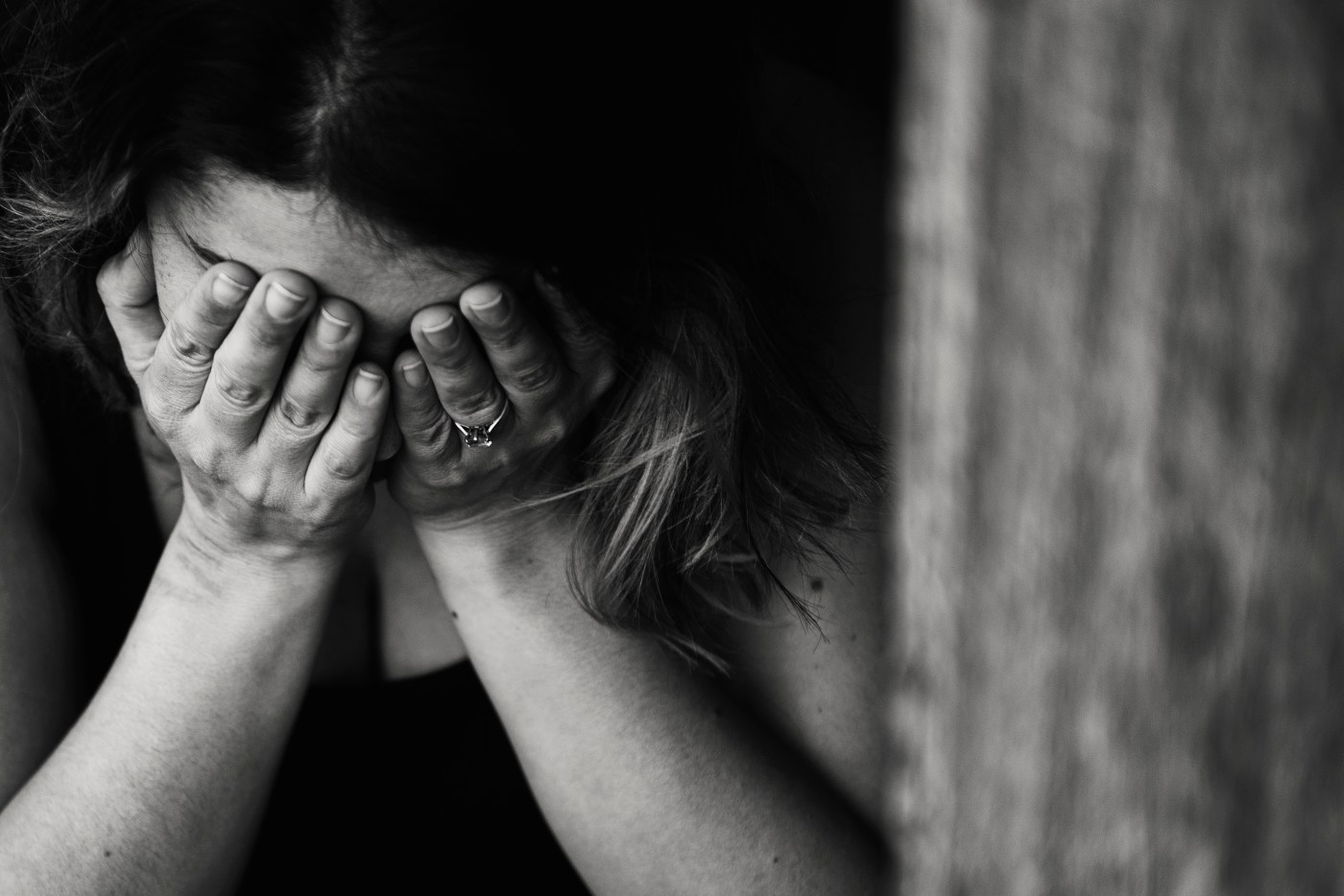 Woman with a headache in black and white