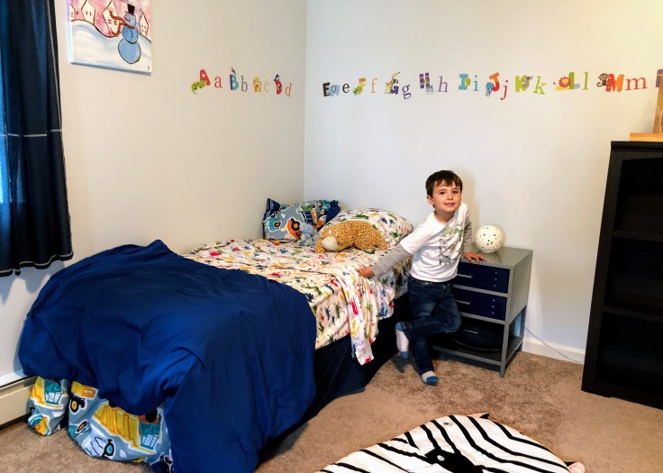 Here's Reece showing off his clean room, so proud.