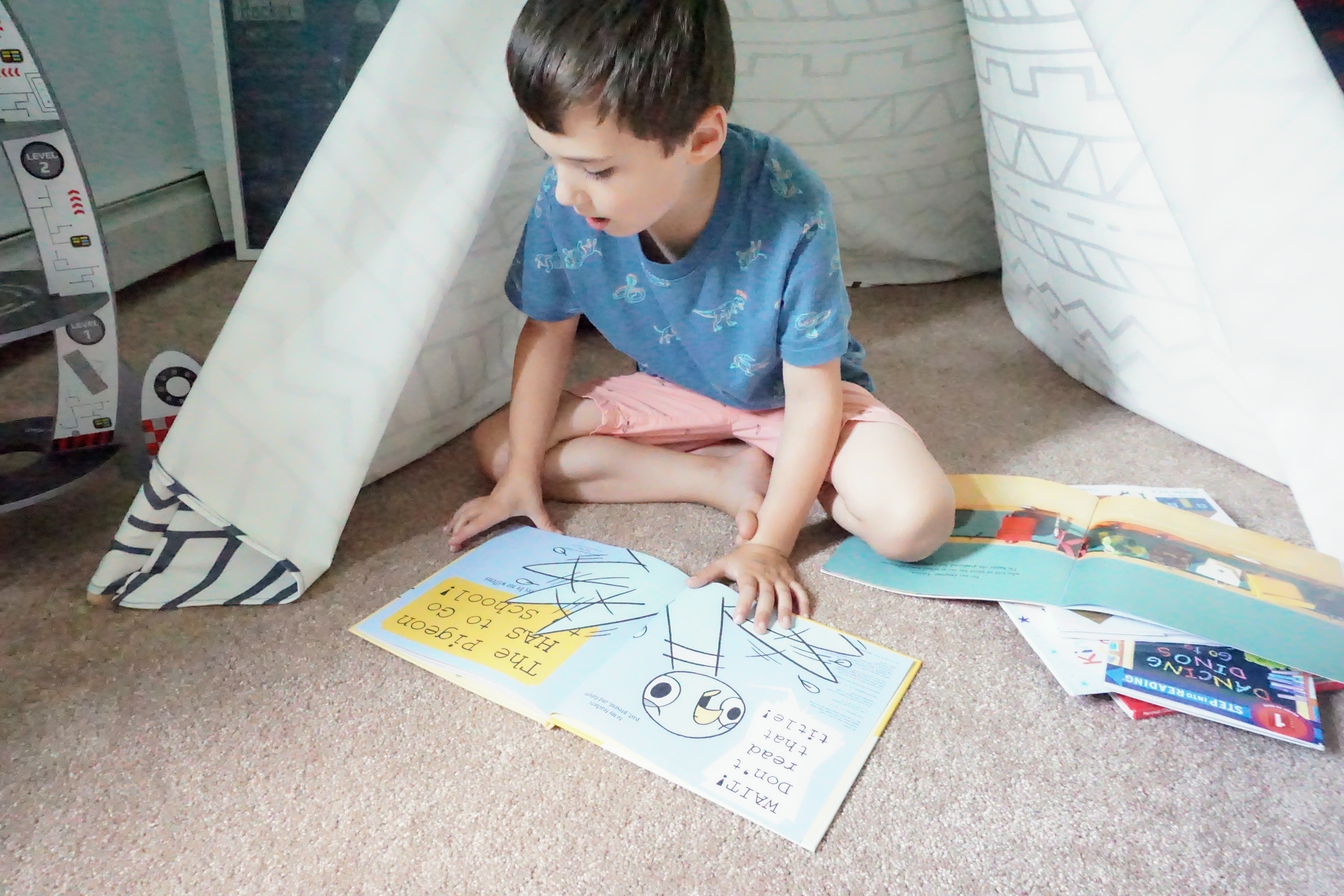 Reece reading Pigeon Goes to School