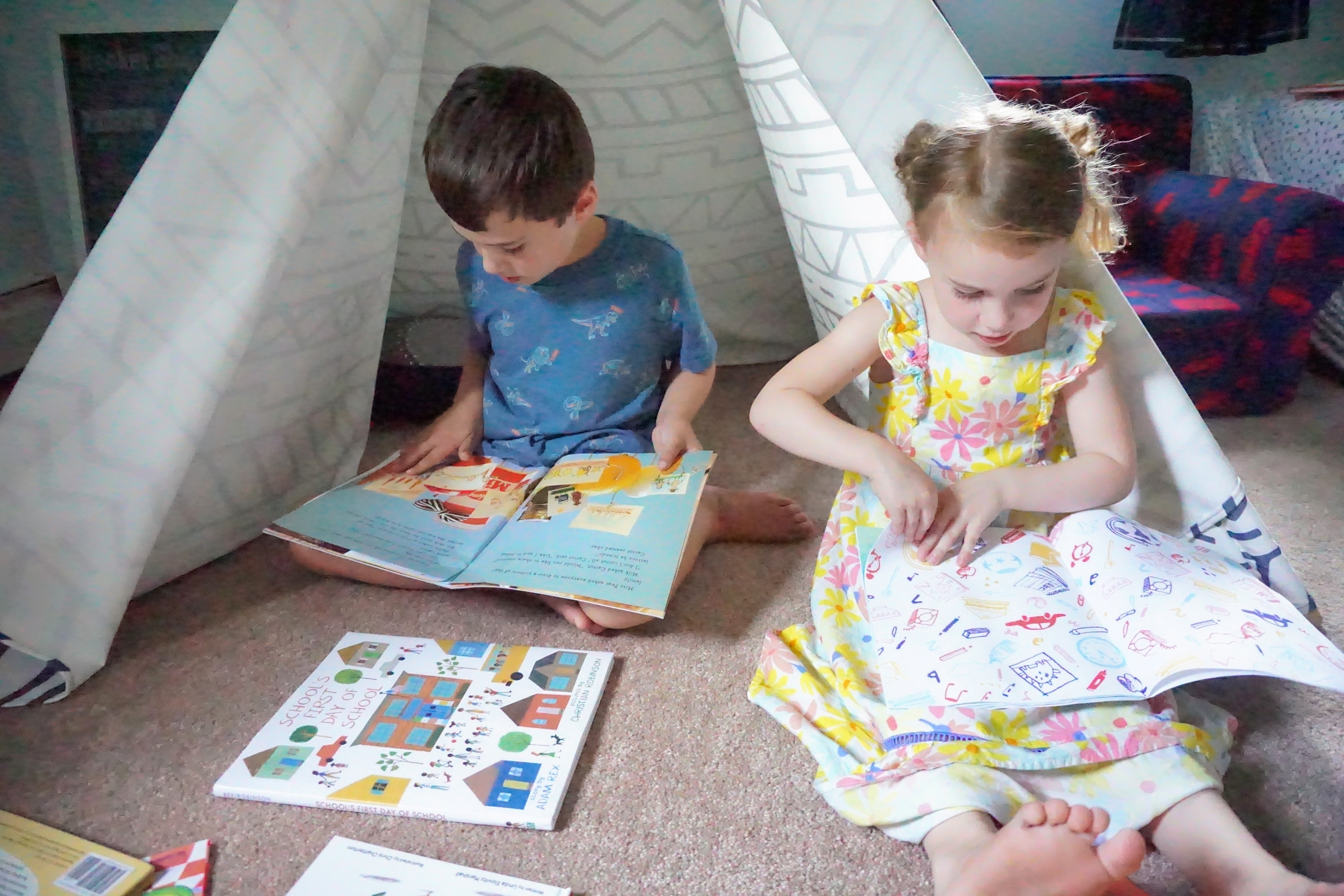 Reece and Kat reading back to school books